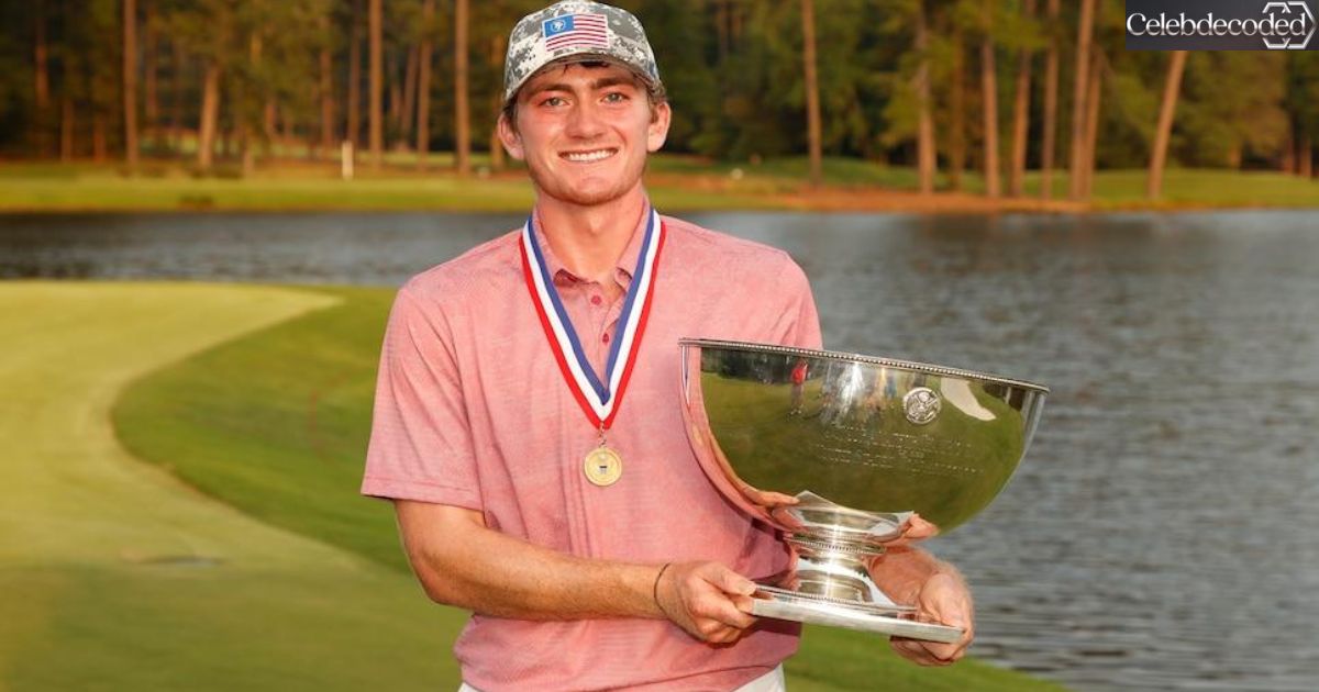 Nick Dunlap holding a championship trophy after winning a major amateur golf tournament during his early golf career